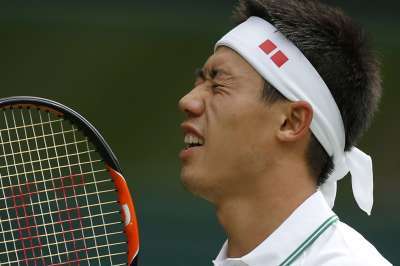 Japans Kei Nishikori reacts during his match against France's Julien Benneteau